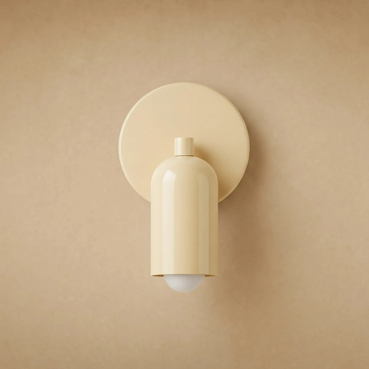 Applique murale Nolvina en métal laqué crème, platine ronde et cylindre arrondi, vue de face