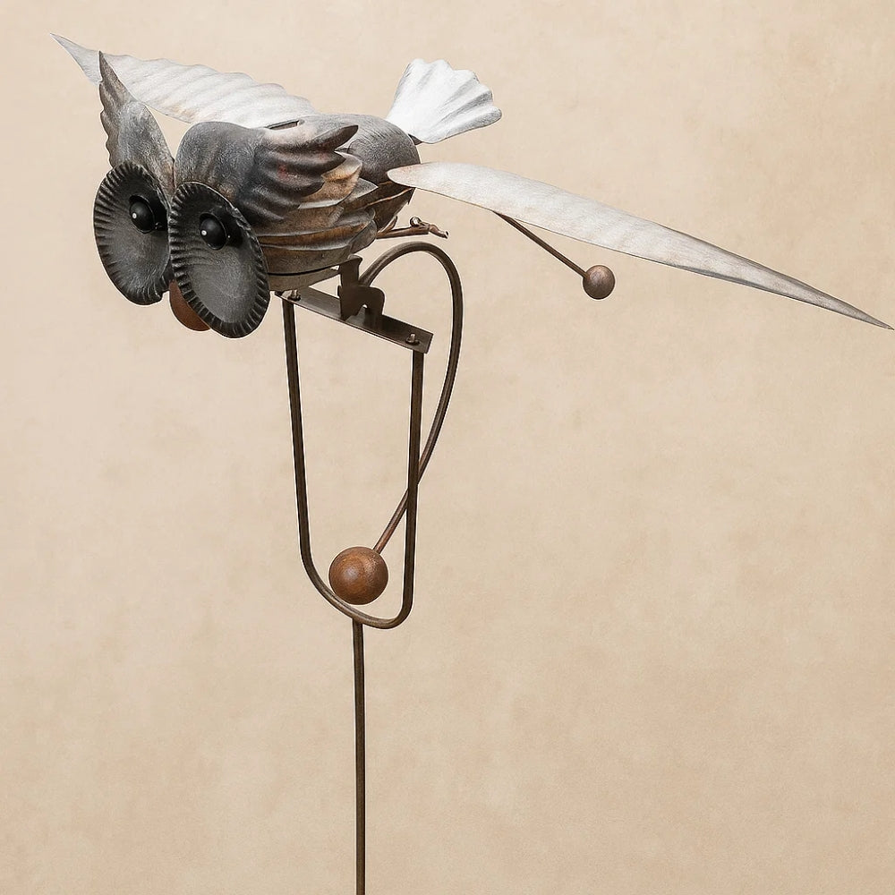 Dynamic Metal Garden Sculpture with Wings
