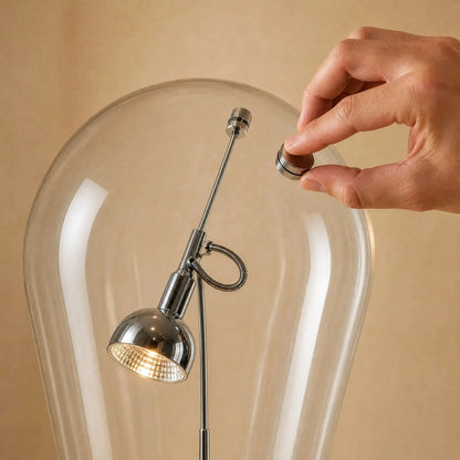 Détail du palet aimanté qui oriente le projecteur à travers le verre