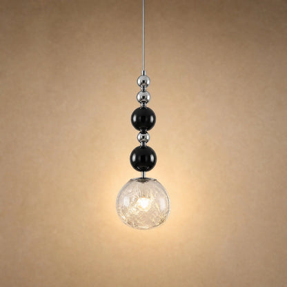 Suspension art déco à perles noires et globe craquelé transparent de 15 cm | Delvanie