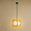 Suspension colorée Asobya, cube jaune en fer forgé et globe en verre opale | Delvanie