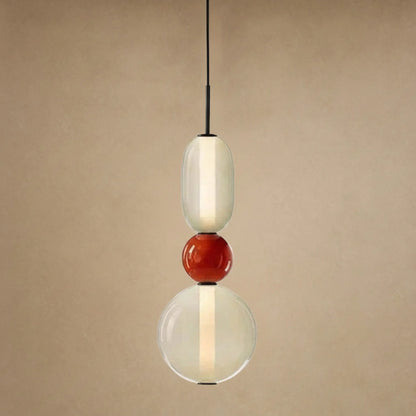 Suspension verre coloré Zuccara, trois perles à bille rouge et crème, hauteur 39 cm