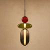Suspension verre coloré Zuccara, trois perles rouge, olive et fumé, hauteur 37 cm
