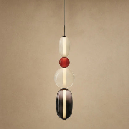 Suspension verre coloré Zuccara, quatre perles à bille rouge et fumé, hauteur 69 cm