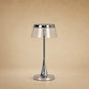 Lampe rechargeable Sévali, abat-jour transparent et couronne chromée, hauteur 27 cm | Delvanie