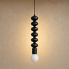 Suspension métal noir Tamayu, colonne de six perles noir mat et globe opale | Delvanie