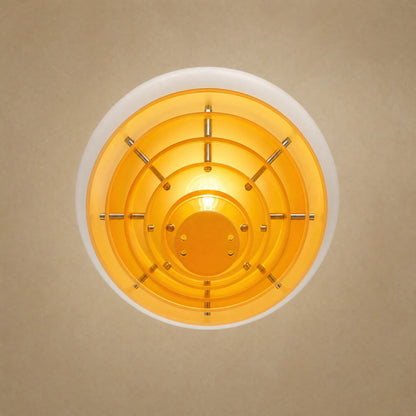 Suspension orange Ambrino vue de dessous, six disques ambrés concentriques et ampoule E27 | Delvanie