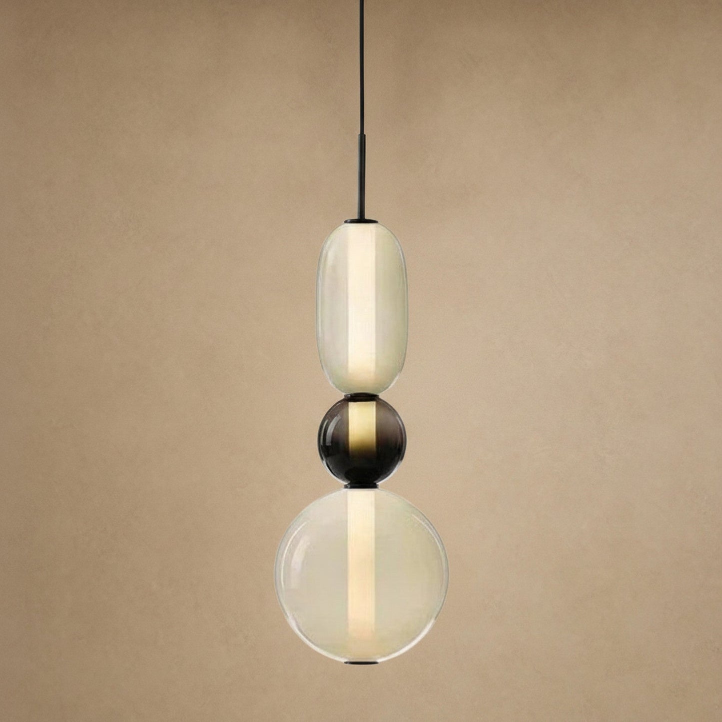 Suspension verre coloré Zuccara, trois perles à bille noire et crème, hauteur 39 cm | Delvanie