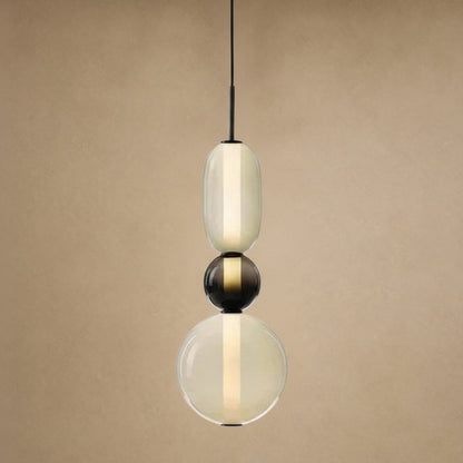 Suspension verre coloré Zuccara, trois perles à bille noire et crème, hauteur 39 cm | Delvanie